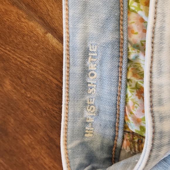 American Eagle Next Level Stretch High-Waisted Distressed Denim Shorts - Picture 8 of 11